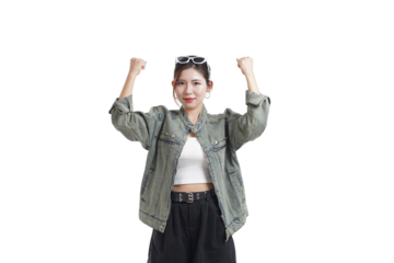 Joyful Attitude: A young woman embraces the spirit of achievement, embodying happiness and excitement with a bright smile and raised fists, radiating confidence.