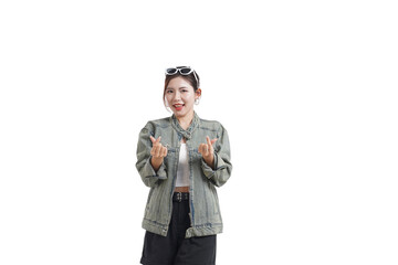 Heart Gesture: A young person poses with a cheerful expression, showcasing a finger heart gesture, symbolizing love and friendship.