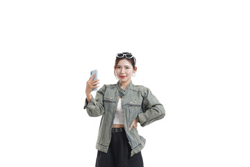 Selfie Time: A poised woman confidently holds her phone, capturing a moment in her day. Emphasizing self-expression, technology, and modern lifestyle. 