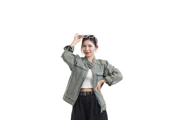 Fashionable Pose: A stylish individual stands confidently, with sunglasses atop the head, the person's elegant charm and fashionable outfit in this contemporary studio shot.