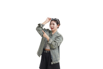 Enthralled Glance: A fashionable woman, with sunglasses poised, gazes and points to something fascinating, capturing a moment of awe. 