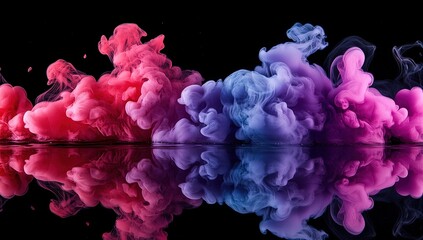 Obraz premium Red and purple smoke on a black background, a color splash, a color explosion, pink, red, and blue, a smoke cloud in water.