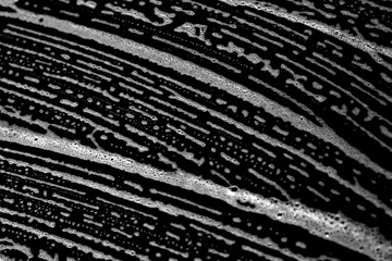 Minimal black and white pattern.  Minimal monochrome texture featuring scratched and distressed surface details for grunge style projects.