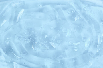 Naklejka premium Moisturizing serum or essence: surface of thick gel with bubbles.