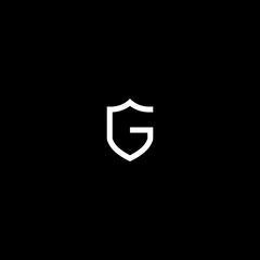 G logo with shield shape