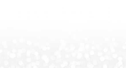 Abstract grayscale bokeh lights create a dreamy and ethereal atmosphere with a soft focus effect