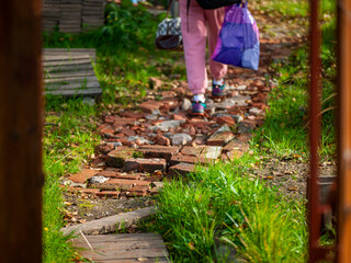 bad road covered with crushed bricks