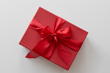 Red Christmas gift box on a white background.
