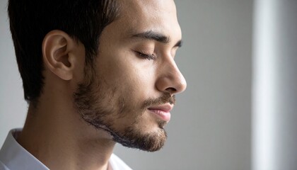 Fototapeta premium Serene Young Man Meditating Peaceful Mind Tranquility Wellness.