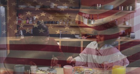 Sharing breakfast couple sitting at wooden kitchen table, with eggs, toast and US flag overlay