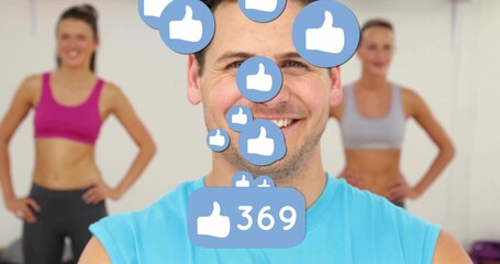 Man in blue sleeveless top posing in fitness studio, with thumbs-up icons and 369 like counter