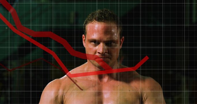 Standing shirtless man staring forward in dimly lit gym, with grid overlay and red trend lines