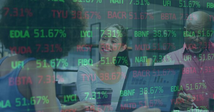 Reviewing three professionals analyzing financial data at conference table, with stock tickers