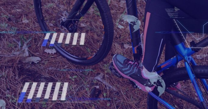 Fototapeta Balancing cyclist wearing pink leggings on wooded trail with blue bike frame and digital overlays