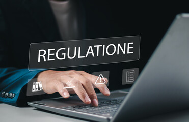 Corporate regulations and compliance concept, rules, law, standard, Businessman touching regulation word and icons on virtual screen.