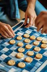Friends Playing a Board Game With Cookies on a Blue Checkered Tablecloth in a Cozy Room