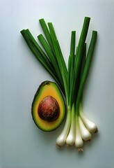 Fresh Avocado and Green Onions Arranged on a Light Background for Healthy Cooking Ideas