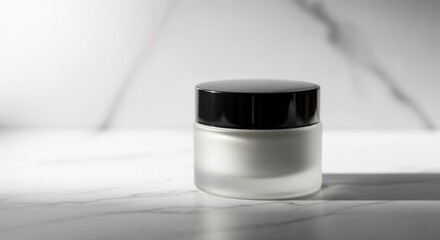 Minimalist frosted glass skincare jar on a white marble background with natural light and shadows.