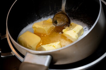 Honey, Maple Syrup, Butter and Sugar in Saucepan, for dough preparation.