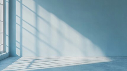 Sunlight streams through a window casting shadows on a blue wall and floor.