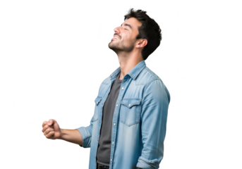 Man with holi colors on face celebrates with fist pump and uplifted gaze transparent background