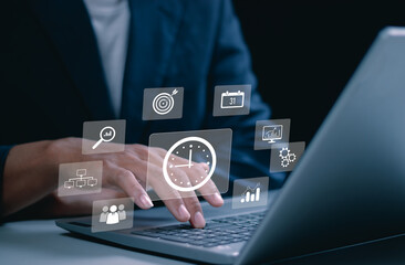 Time management concept. Businessman use laptop to work planning for increases efficiency and reduces work time. Business project planning.