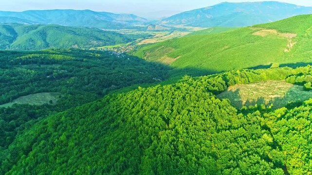 Aerial panorama view, green summer mountains nature, village, skyline