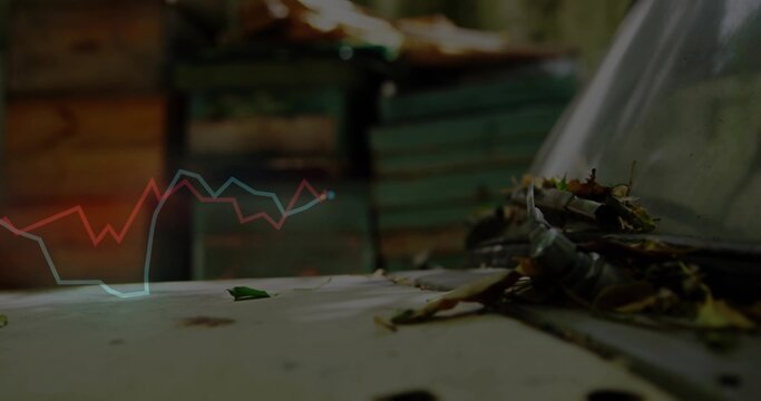 Fototapeta Worn car hood and windshield gathering leaves in garage, with rust spots and overlaid graph