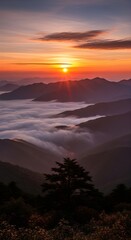 Sunrise over misty mountains casting golden light on rolling cloud waves