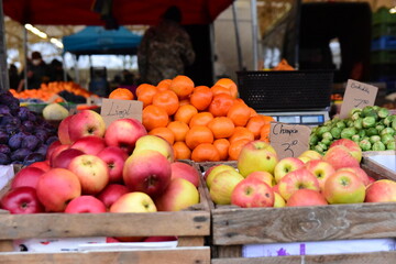 Fresh apples and mandarins at local market © Magorzata