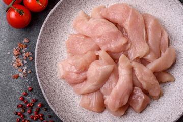 Strips of raw chicken or turkey fillet, skinless and boneless poultry breast. Chicken fillet strips