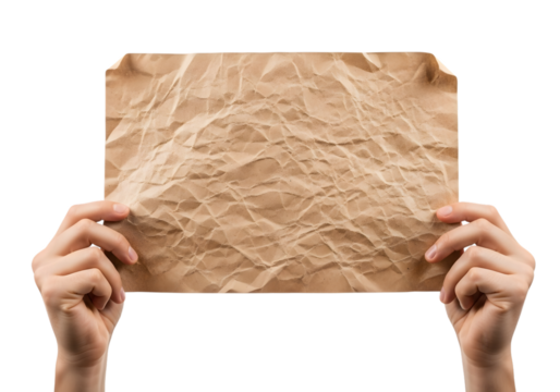 Hands hold a crumpled piece of brown paper, isolated on transparent background
