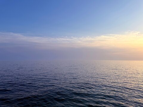 Blue ocean and dusk sky at evening.