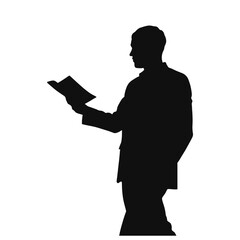 Man reading document while standing in silhouette against white background  