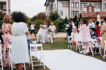 wedding ceremony of the newlyweds on the glade © omelnickiy