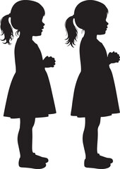 Two young girls standing side by side silhouette