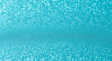 Obraz premium Sparkling turquoise bokeh lights create a magical, celebratory atmosphere perfect for festive designs and vibrant backgrounds.