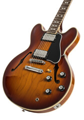 Obraz premium Classic Gibson ES-335 style semi-hollow body electric guitar, rich brown sunburst, white binding, chrome, humbuckers, dynamic angle, high-key studio, transparent background, iconic object of superior