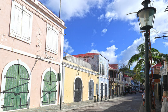 Colorful Buildings. Street at Saint Thomas. US Virgin Islands in the Caribbean. Sunny Blue sky day