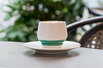 a cup of coffee on a table