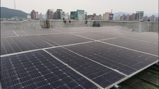 A professional photo for energy and sustainability brands. A cinematic shot of a solar panel rooftop for a campaign on urban renewable energy, corporate responsibility, and a green future.