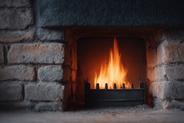 A warm and cozy fire burns in a rustic brick fireplace