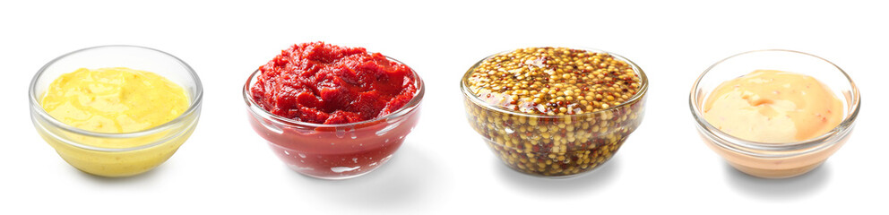 Set of different sauces on white background