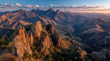 Fototapeta premium and keyword list based on the imageMountains Standing Tall Under Golden Sunset Light in a Rural Wilderness