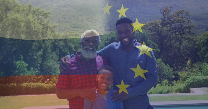 Smiling three-generation males standing in backyard poolside, with yellow star overlay