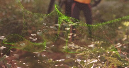 Floating neon green digital mesh wave weaving above forest floor, with ferns, leaves, hiking boots