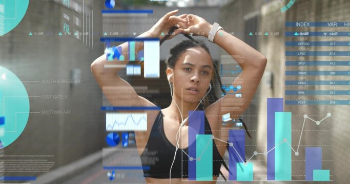 Running athlete wearing wristband and earphones in underpass with handrails, with data overlays - Powered by Adobe