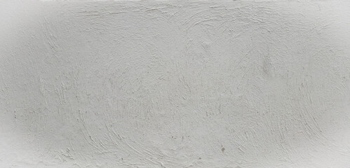White background in the form of a part of a painted wall. Vignette. Space for creative text, advertising. Copy space 