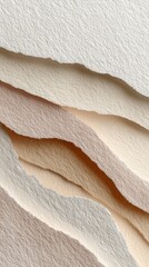 Stacked, textured paper layers in neutral tones, torn edges creating an abstract design