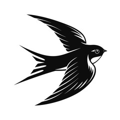 Elegant swallow in mid flight silhouette